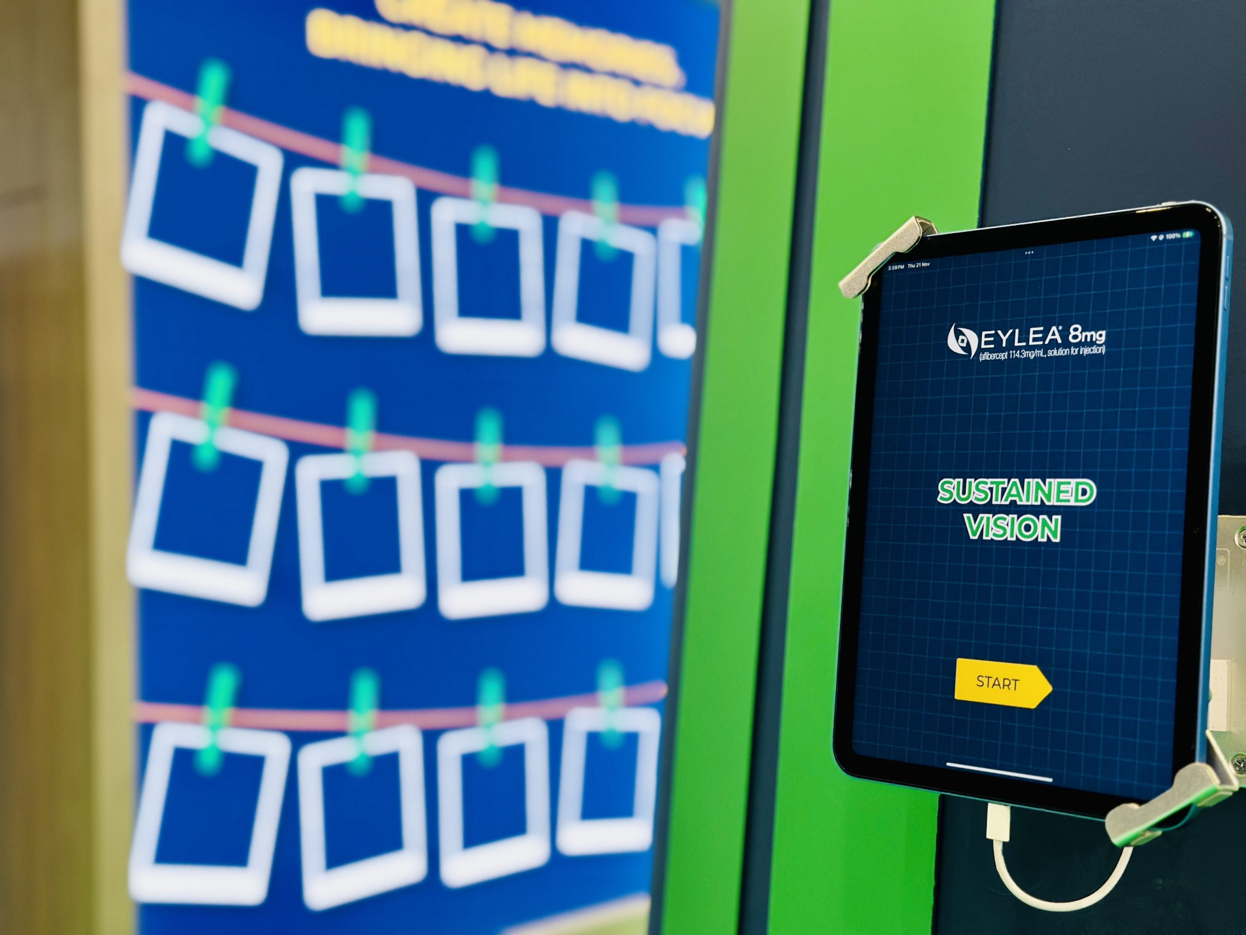 An iPad mounted on the Tree of Memories for attendees to share messages to the LED screen in the background