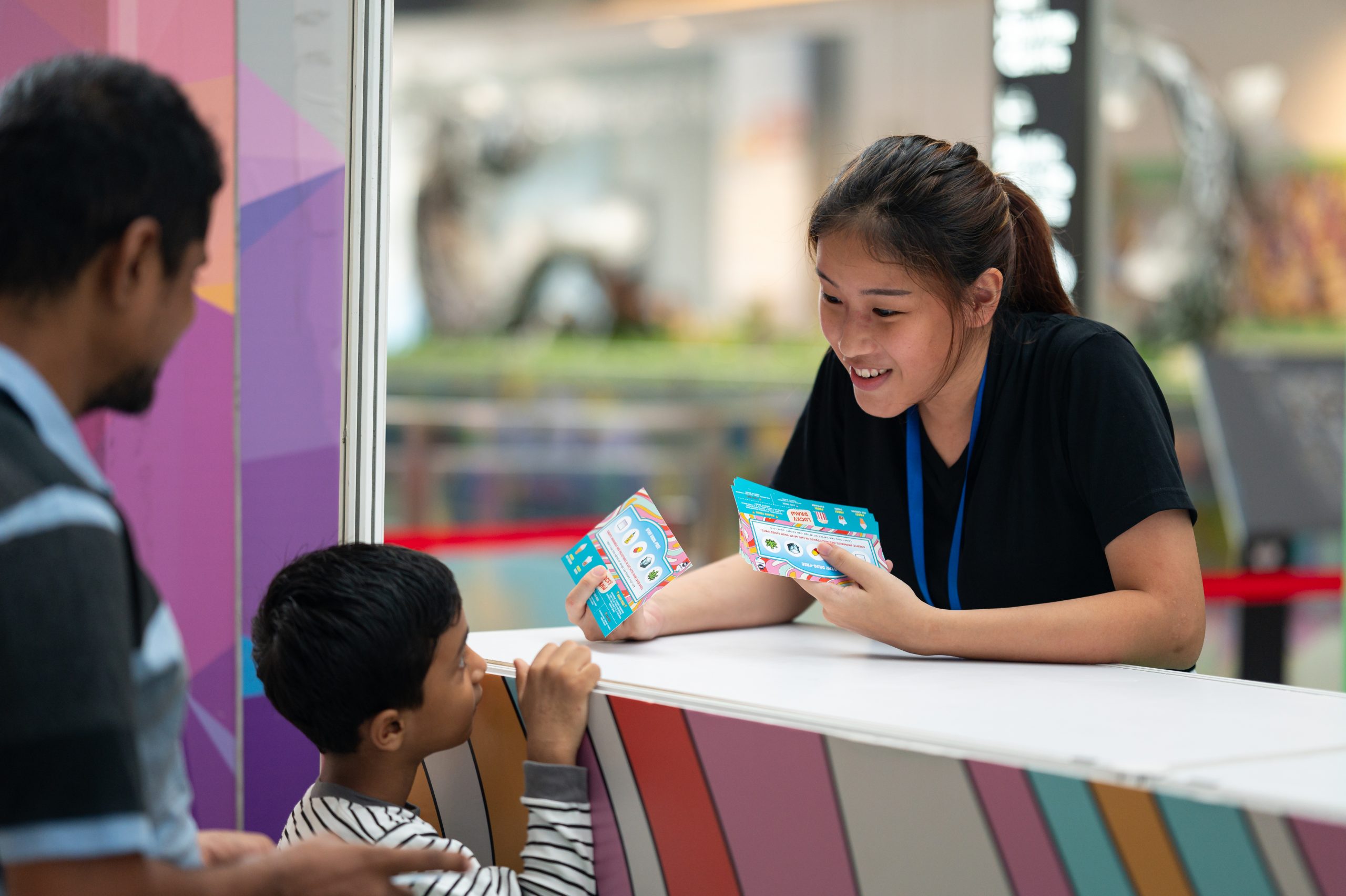 Our friendly event crew handing out and explaining Quest Cards to participants
